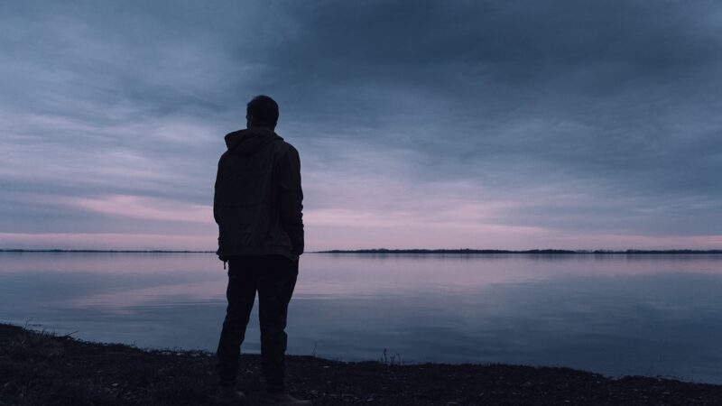 Person looking out to sea.